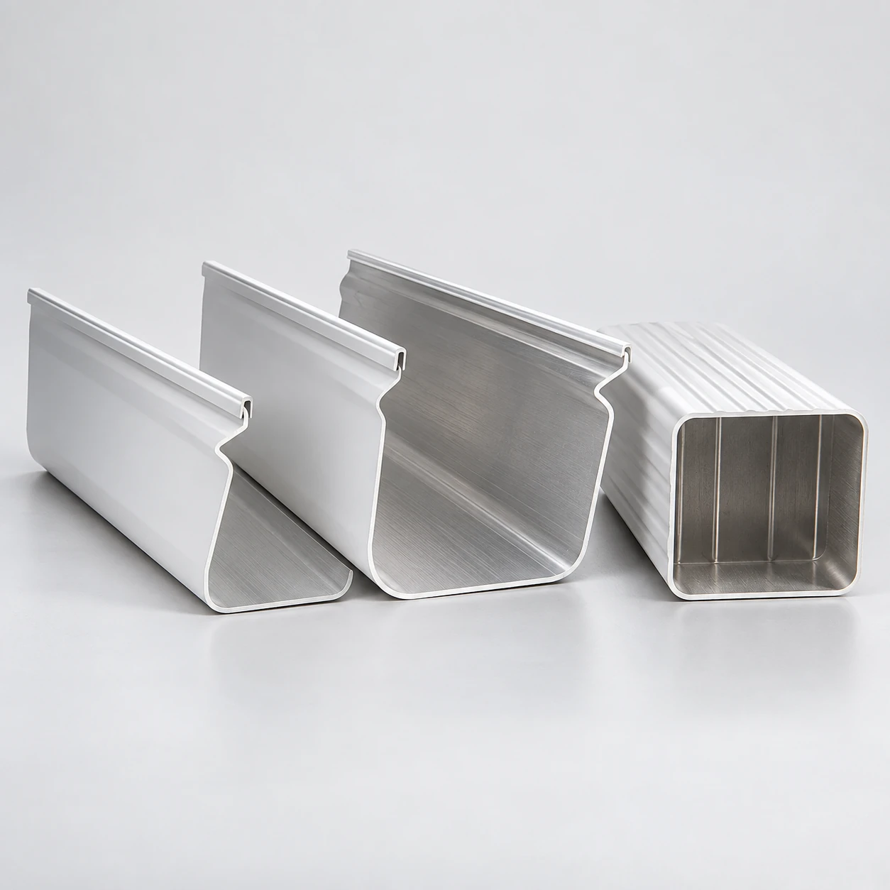 Aluminum gutter and downspout profiles