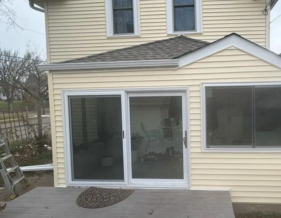 Home addition with a gutter along the roof edge and a downspout at the corner, a Johnson Exteriors exterior project